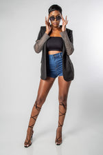 WOMAN IN SUNGLASSES POSING WEARING OUR CHIC BLACK  BLAZER WITH CRYSTAL MESH SLEEVES-MISCHUN